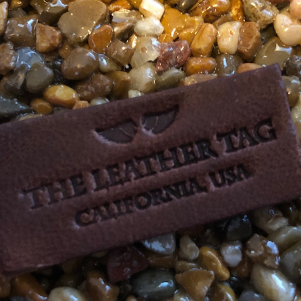 The Leather Tag Posher.